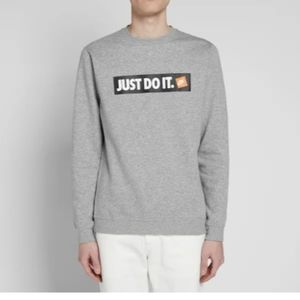 Grey Nike sweatshirt